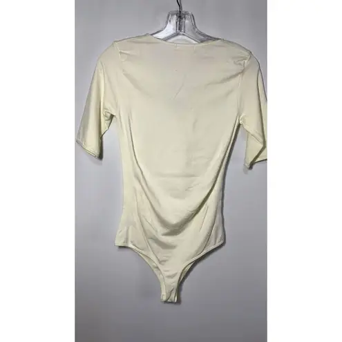 La Winner Cream Half Sleeve Crisscross Detail Body Suit Size M/L Size L