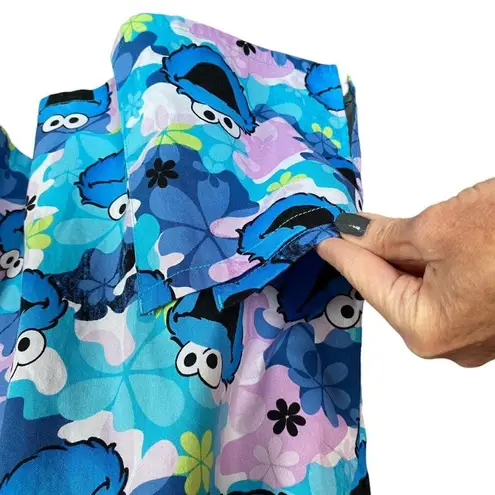 Sesame Street women's L blue and lavender short sleeve cookie monster scrub top