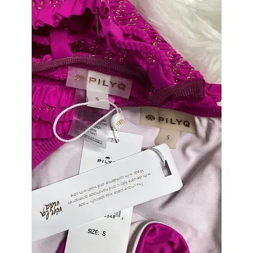 PilyQ New fuchsia smocked bikini set. My bottoms are a slightly different design.