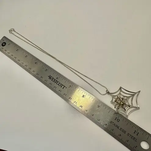 Two tone spider web pendant necklace Silver