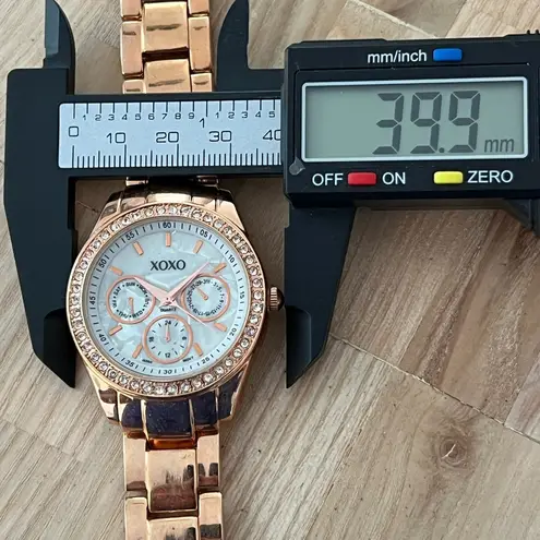 XOXO Ladies Watch Crystal Embellishments Pearl Dial Rose Gold Tone Bracelet