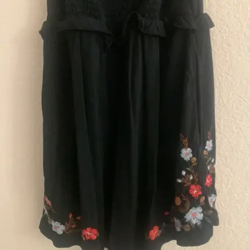 American Eagle romper | size medium | black with red flower embroidered