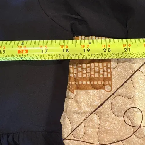 Mary Square V neckline and a gathered, peplum