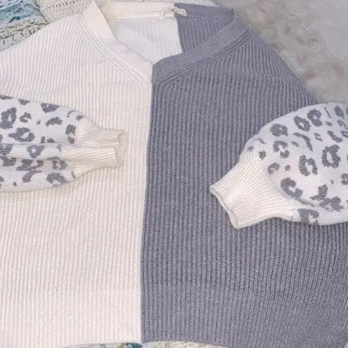 ee:some  grey leopard print sweater size small/medium