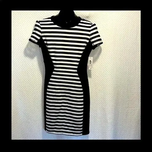 Bisou Bisou NWT $72  Slimming dress Black & White print Bodycon sexy date.