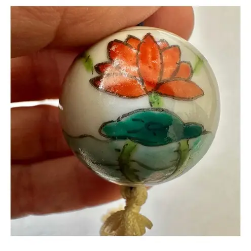 Chinese hand painted ball with tassel necklace on cord