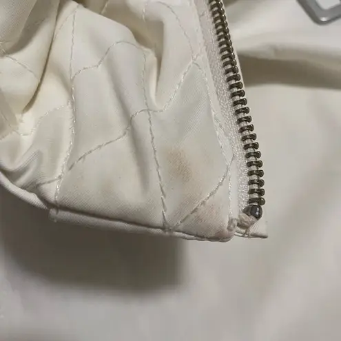 Stylish NILS insulated white ski jacket with custom metal accents Size 10P