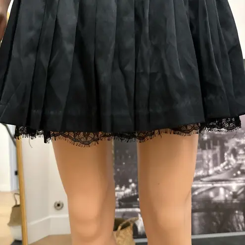 Bebe  Black Pleated Mini Tennis Skirt with lace