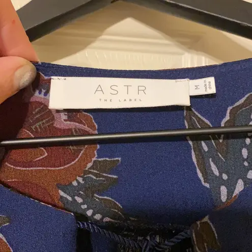 Revolve ASTR The Label  long sleeve boho ruffle hem navy floral romper, size M