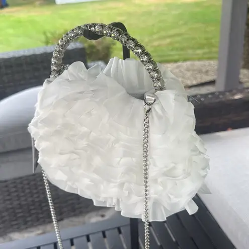 Sincerely Jules, silver rhinestone and white ruffled satchel