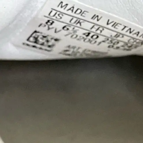 Adidas  sleek super platform white sneakers.