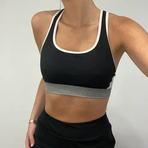 Calvin Klein / Revolve New Flex Motion Medium Impact Sports Bra in Black Color Block