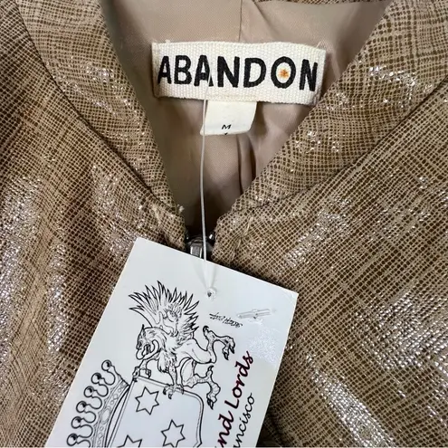 Abandon Size Medium Italian Shine Coated Leather In a Caramel Color w/Pockets Tan
