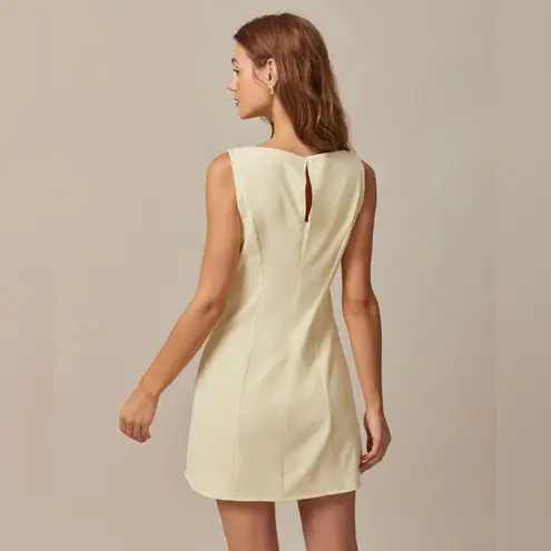 Rihoas Yellow Boat Neck Cutout Mini Dress