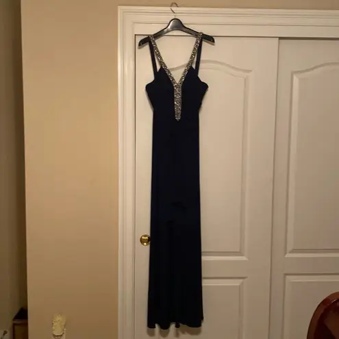 The brand is JS Boutique, it’s a size 10, and it’s color is navy blue.