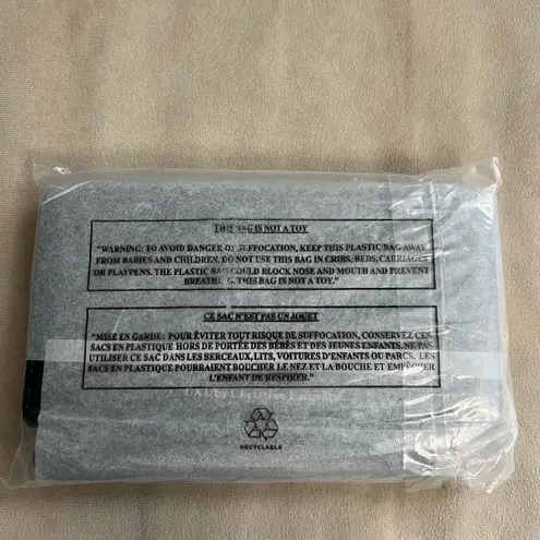 Christian LaCroix CXL by Porte Embossed Logo Teal Zip Around Wallet NWT