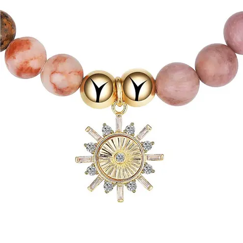 Love this life NWT 14k Gold Plated Cubic Zirconia
Multi-Color Sun Stretch Bracelet