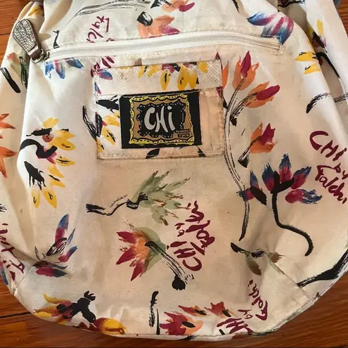 Chi Boho Brown Leather with Snake Skin Handle And Magnetic Snake Skin Closure.