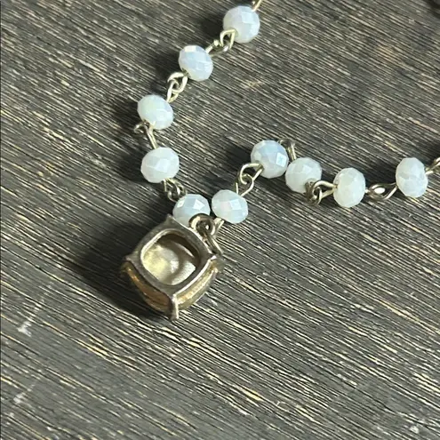 This is a moonstone beaded bracelet with a cushion