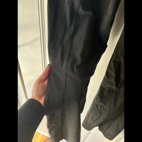 Lululemon  black bootcut leggings. No size but fits like a 10. Some wear