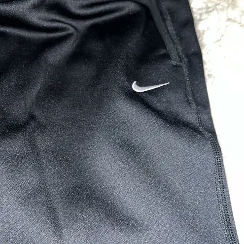 Nike Like new  dri fit black pants with pockets