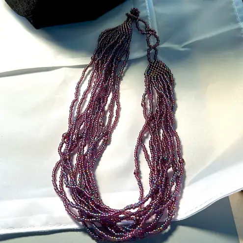 Iridescent purple seed bead 12