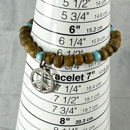 Set Of 3 Beaded Stretch Bracelets Red Blue & Natural Wood Beads Peace Sign Charm