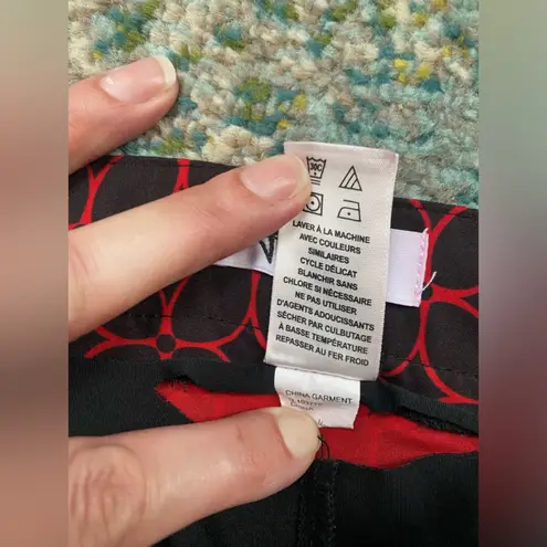 Greg Norman women’s red ring graphic print athletic golf skirt, size 10