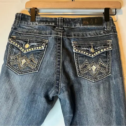 Vintage Blue Boot Cut Jeans with Flattering Silhouette Size undefined