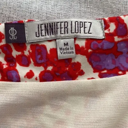 Jennifer Lopez  snake print sleeveless mini shift dress.