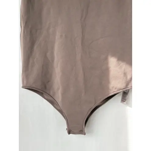 SKIMS NWOT Essential mock neck Sleeveless bodysuit S/M Tigers eye