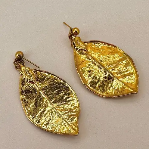 Gold tone leaf post earrings