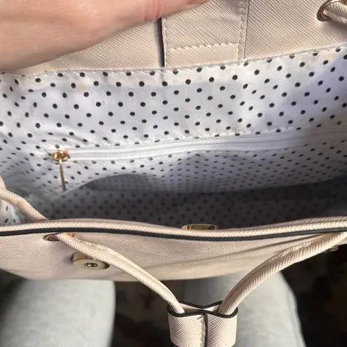 Stylish Cream Backpack with Gold Accents