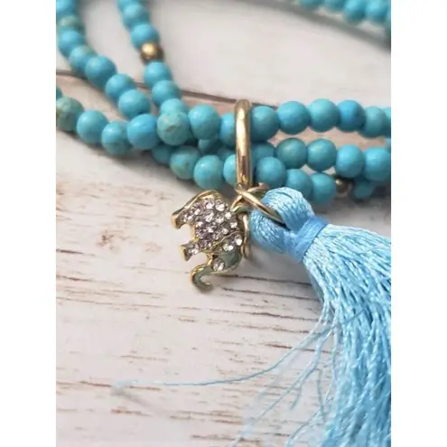 Vintage Bracelet / Bangle Stretchy Turquoise Tone with Tassel & Elephant Blue