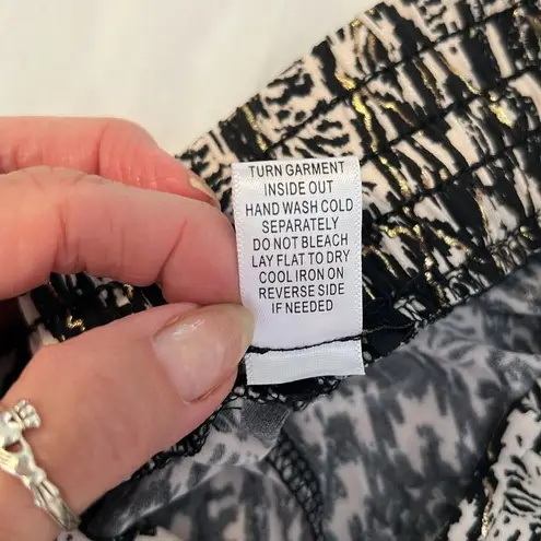 Iman size small black white metallic gold print wide leg pants worn 2 times EUC