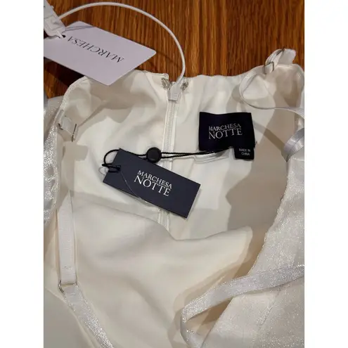 Marchesa Notte High Low Tea Length Gown in a metallic Ivory size 10 /M