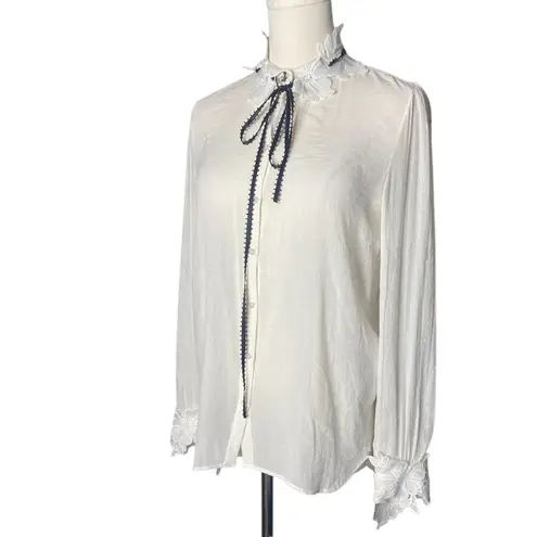 Maje Off White Blouse
1 (XS/S)