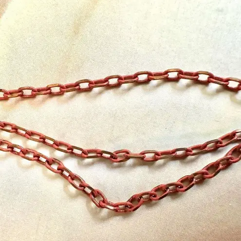 Gold tone orange multi strand chain necklace