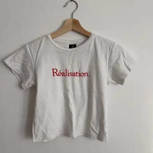 Realisation Par Réal Logo Baby Tee in White