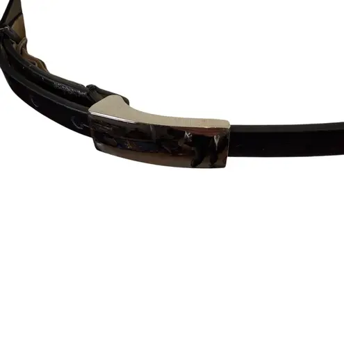 Women's black skinny adjustable leather belt with silver buckle