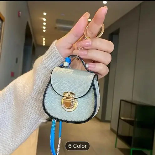 Elegant Mini Saddle Bag Brown Keychain with Premium Silk
Scarf