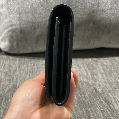 YSL YVES SAINT LAURENT Grain De Poudre Star Studded Monogram Wallet in Black