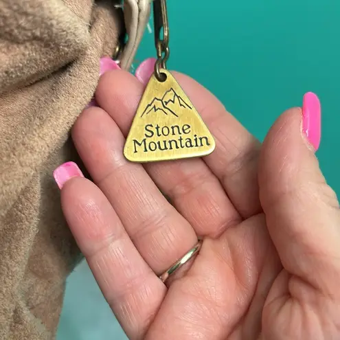 Stone Mountain Suede Embossed Swirl purse