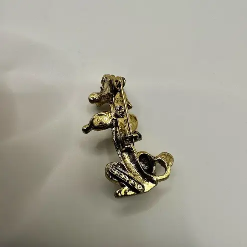 Gerry’s gold tone poodle brooch