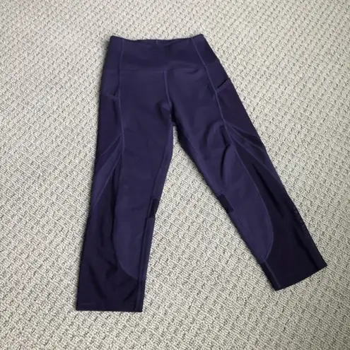 Women dark purple leggings size small…