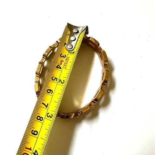 Gold tone link hinged bracelet
