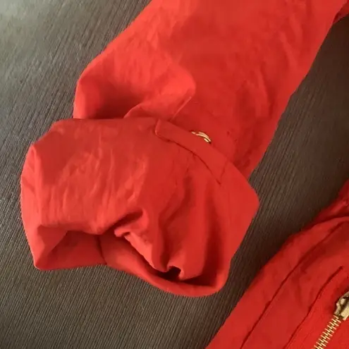 EUC G.E.T. equipment. general. technique bright orange rain coat. Size XS