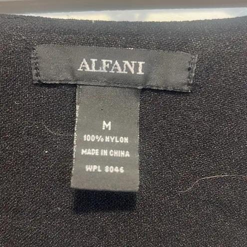 Alfani  snakeskin bedazzled mesh top with lining and bell sleeves size medium.