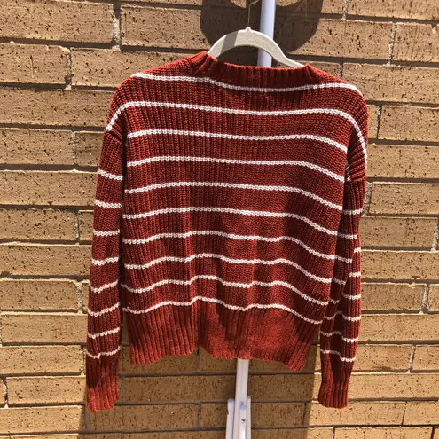 Brown and white striped long sleeve crew neck sweater