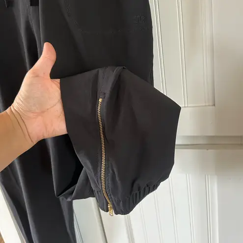 Albion Fit Nine To Nine Ruffle Sleeve Jumpsuit black size medium